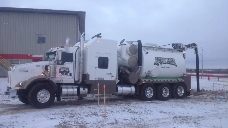 Rippin Edge hydrovac truck working in the snow