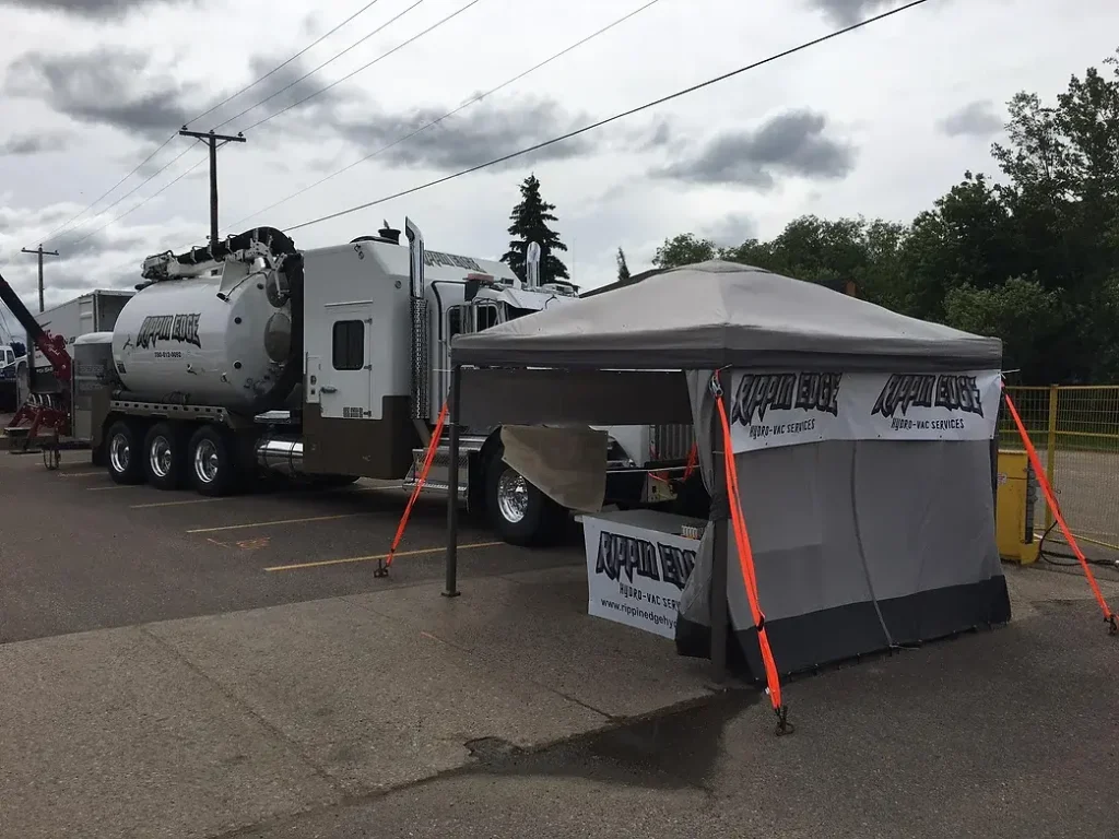 Rippin Edge Hydrovac truck and tent roadside showcase